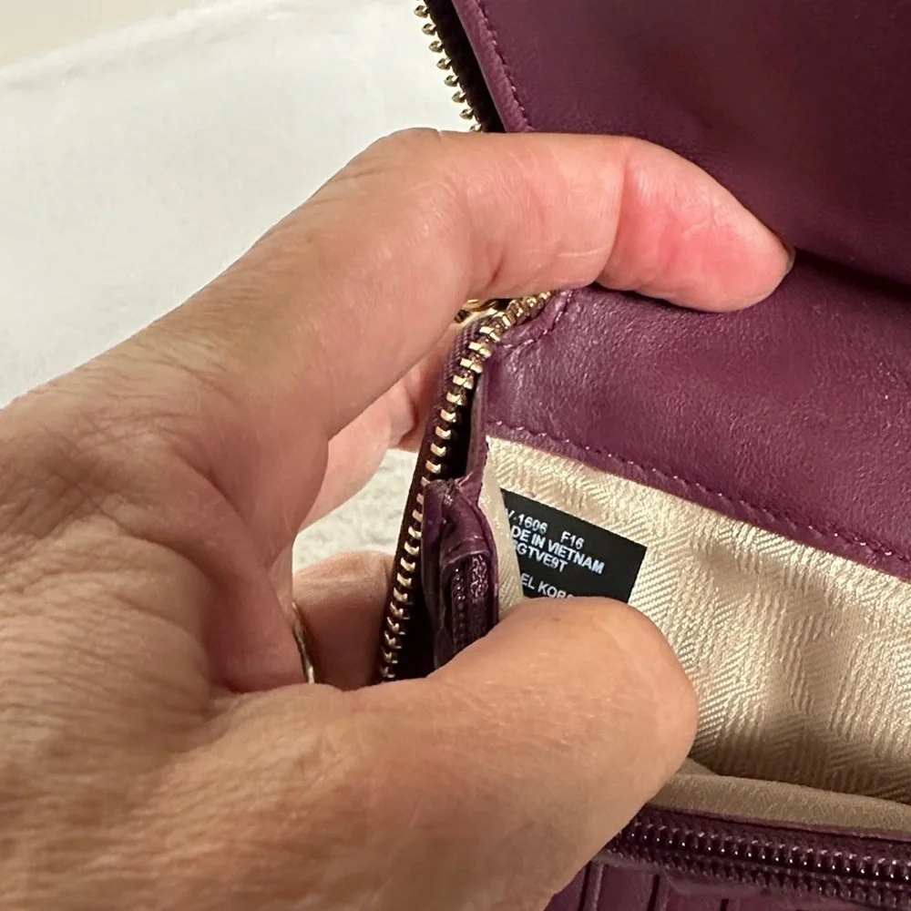 Michael Kors Plum Quilted Wristlet/ wallet